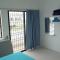 Santorini 4 Bedrooms Full Air Cond Entire Home by Grab A Stay