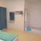 Santorini 4 Bedrooms Full Air Cond Entire Home by Grab A Stay