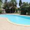 Mediterranean poolside garden cottage