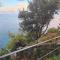 Cokkinis villa with garden overlooking the sea