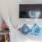 Greek Island Style 2 bedroom Villa with Pool next to the Sea