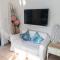 Greek Island Style 2 bedroom Villa with Pool next to the Sea