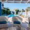 Greek Island Style 2 bedroom Villa with Pool next to the Sea