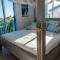 Greek Island Style 2 bedroom Villa with Pool next to the Sea