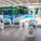 Greek Island Style 2 bedroom Villa with Pool next to the Sea