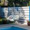 Greek Island Style 2 bedroom Villa with Pool next to the Sea