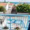 Greek Island Style 2 bedroom Villa with Pool next to the Sea