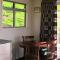 Foto: Mandhari Bed and Breakfast Cottage 11/30