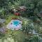 West Indies Cottage, cottages haut de gamme avec piscine, jacuzzi et vue jungle