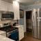 1 mile to Fort Sill! The CaroleBelle Cottage sleeps 8 with hottub,grills,firepit