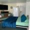 1 mile to Fort Sill! The CaroleBelle Cottage sleeps 8 with hottub,grills,firepit