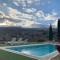 Country house with shared pool and views - Sabina Alta