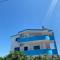 White & Blue Apartments