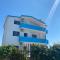 White & Blue Apartments