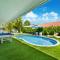 Breezy Oasis with Pooltable, Heated Pool, Golf & Gazeebo L29