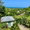 Le Surf Lodge, chambre avec vue mer dans un écrin de verdure - Deshaies