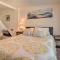 Sun-Lit Lake Geneva Sanctuary with BBQ Patio!