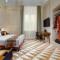 YourHome - Maison Iovino Luxury Rooms