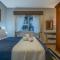 Casa de Pedra - 301D - Apto com piscina em Gramado - 格拉玛多