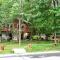 Peaceful Pocono Lakefront, beach, pools, firepit, pets