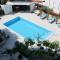 Family friendly apartments with a swimming pool Novalja, Pag - 14396
