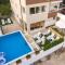 Seaside apartments with a swimming pool Mavarstica, Ciovo - 16730 - Trogir