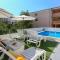 Seaside apartments with a swimming pool Mavarstica, Ciovo - 16730 - Trogir