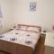Apartments with parking space Novi Vinodolski - 16998