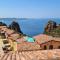 L’Estasi Tanca Piras a bordo piscina con vista mare