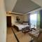 AK Hotel & Suites