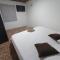 KOMODO ALOJAMIENTO- hostal autoservicio, ubicado cerca al centro histórico - baño privado, wifi , cama 2x2 y agua caliente y cocina compartida