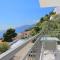 Apartments with a parking space Brela, Makarska - 6043 - Брела