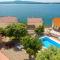 Seaside apartments with a swimming pool Posedarje, Novigrad - 6162 - Posedarje