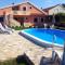 Apartments with a swimming pool Zemunik Donji, Zadar - 6188 - Murvica