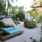 Amanda's Place Green Studio - pool and tropical garden - 库尔克岛