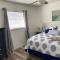Beach Style lake view home with boat parking & minutes to the best beaches!