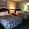 MERRIMAC INN & SUITES