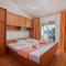 Apartments by the sea Igrane, Makarska - 310