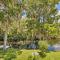 Old Florida Setting with Kayaks and Fishing Poles