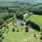 le bateau sur lac privé de 2 hectares poissonneux au milieu des bois - Florennes