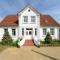Ferienhaus für 8 Personen mit Kamin & Terrasse