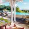 Villa Deluxe lHacienda Villa vue mer 180 piscine jacuzzi proche plage marina golf pointe des châteaux et casino jardin clos voyage durable