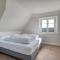 Rantum Dorf - Ferienappartments im Reetdachhaus 3 & 4