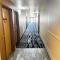 Designer Inn and Suites