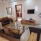 CHAMBRES PRIVEES CLIMATISEES-DOUCHES PERSONNELLES-NEFLIX-SALON