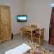 CHAMBRES PRIVEES CLIMATISEES-DOUCHES PERSONNELLES-NEFLIX-SALON