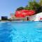 Family friendly apartments with a swimming pool Zivogosce - Porat, Makarska - 18150