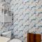 Cheery coastal condo with balcony, AC, W/D, 2 pools, grills, & beach access
