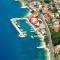 Apartments by the sea Sumpetar, Omis - 18286