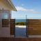 Seafront house with a view